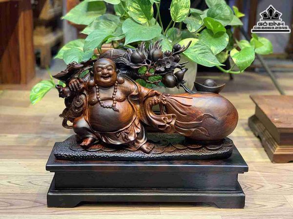 Tượng Phật Di Lặc Kéo Bao Tiền Gỗ Trắc