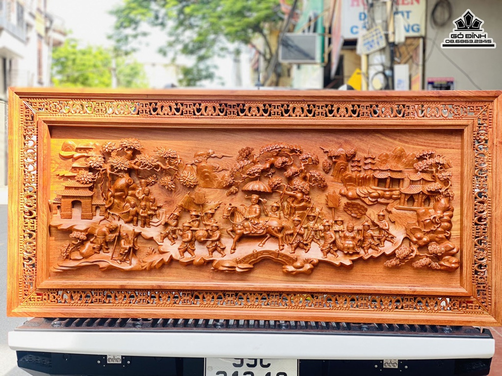 Không nên dùng tranh gỗ treo phòng khách để che đi khuyết điểm của bức tường 