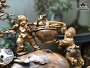 Tuong-Phat-Di-Lac-Keo-Bao-Tien-Go-Bach-Xanh