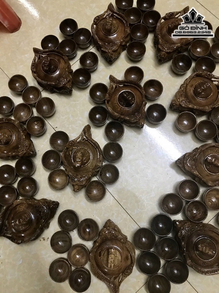 Bộ Ấm Chén Chạm Rồng Gỗ Mun Đuôi Công 0
