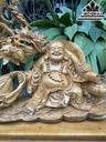 Tượng Phật Di Lặc Kéo Bao Tiền Gỗ Xá Xị Cao 64 Ngang 70 Sâu 20 (cm)