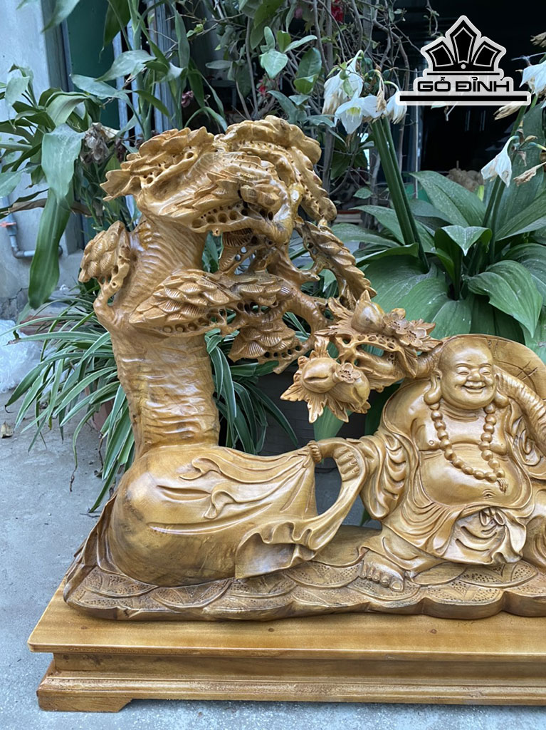 Tượng Phật Di Lặc Kéo Bao Tiền Gỗ Xá Xị Cao 64 Ngang 70 Sâu 20 (cm)