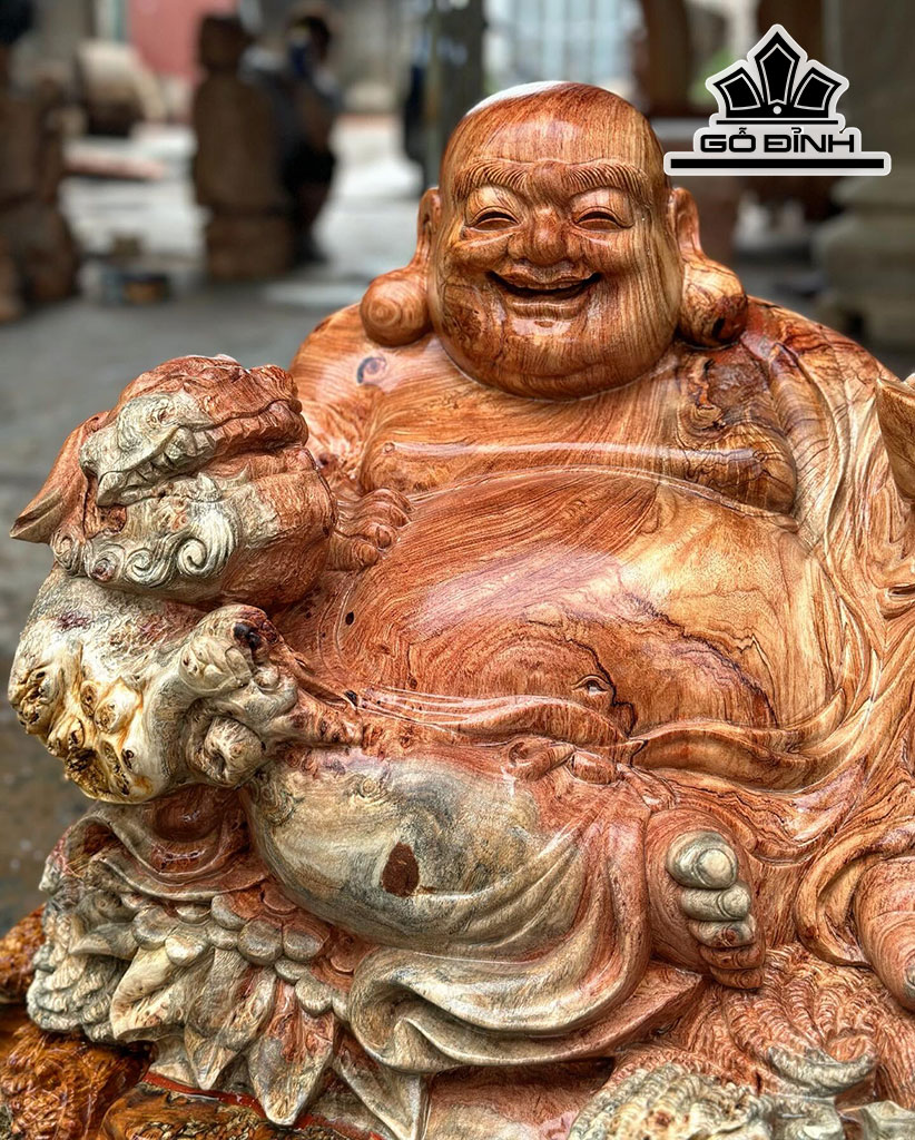 tuong-phat-di-lac-ngoi-be-thoi-vang-go-huong-cao-66-ngang-65-sau-44-cm-431037