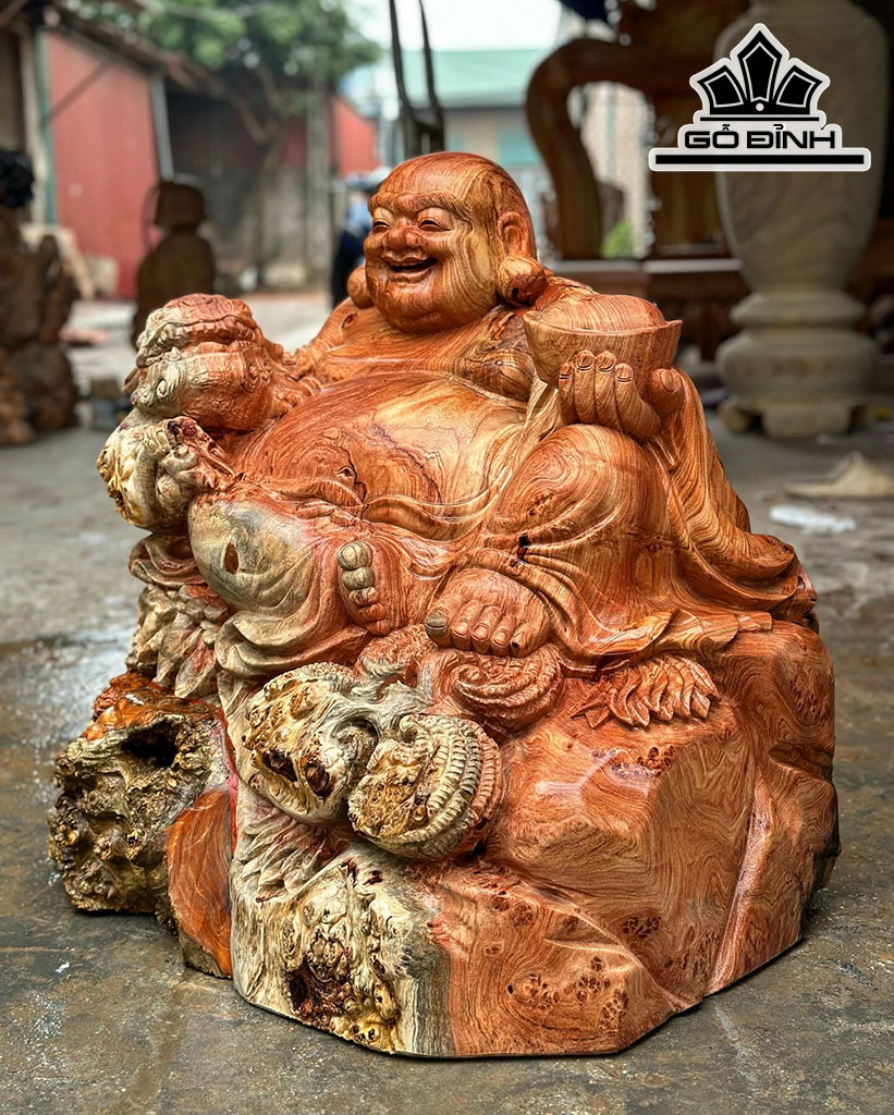 tuong-phat-di-lac-ngoi-be-thoi-vang-go-huong-cao-66-ngang-65-sau-44-cm-431039