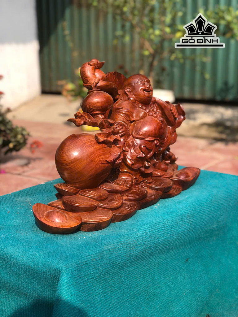 tuong-phat-di-lac-keo-bao-tien-go-huong-cao-36-ngang-60-sau-20-cm-460861