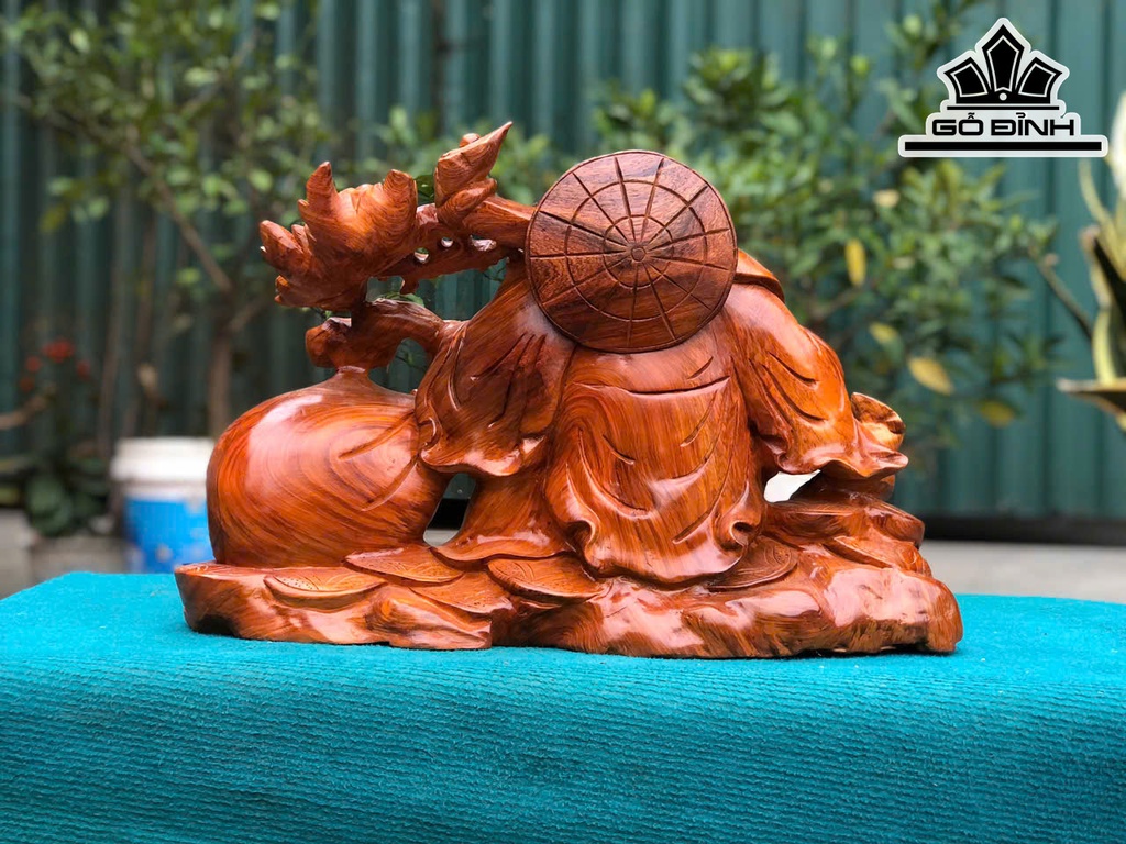 tuong-phat-di-lac-keo-bao-tien-go-huong-cao-35-ngang-52-sau-21-cm-462876