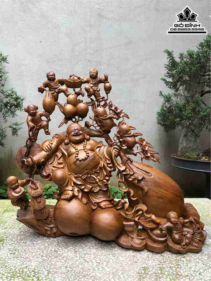 Tượng Phật Di Lặc Kéo Bao Tiền Gỗ Xá Xị (Gù Hương)  Cao 65 Ngang 72 Sâu 26 (cm)